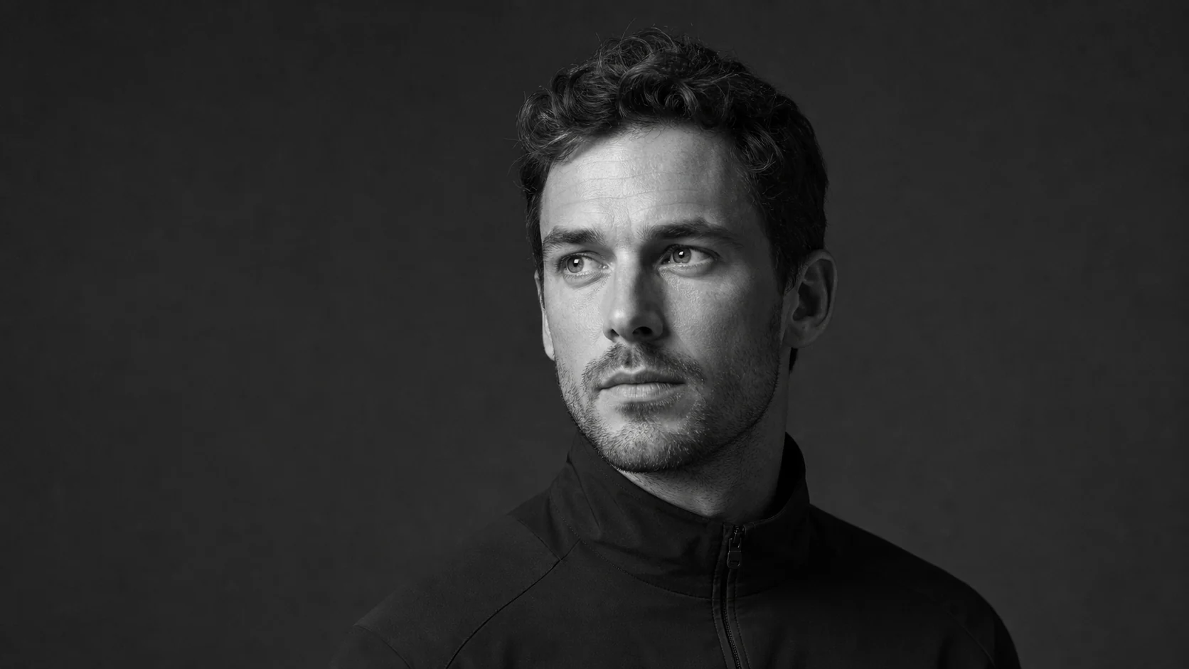 Monochrome portrait of a man looking to the side